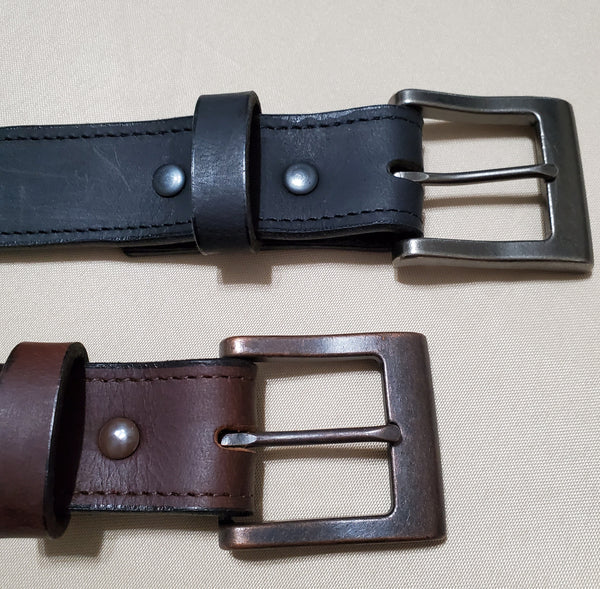 Our 1.5" money belts showing the brushed buckle end in brown and black leather.